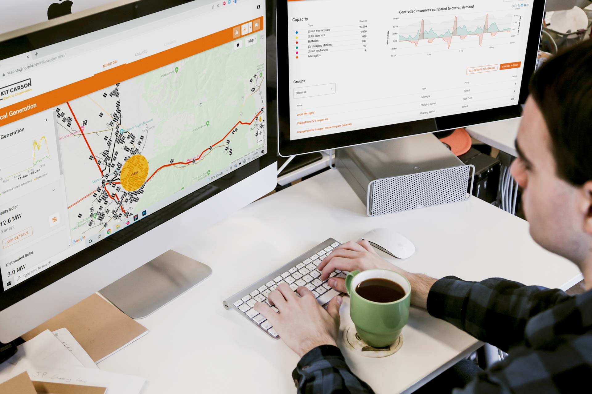 man looking at monitor of utility software